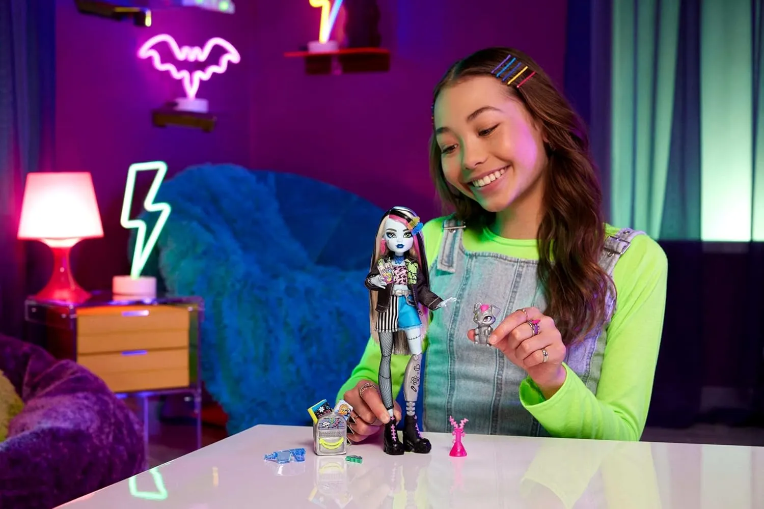 Monster High Frankie Stein Doll in Denim Jacket and Shorts, includes Pet Dog Watzie and Accessories like a Backpack, Snack and Notebook